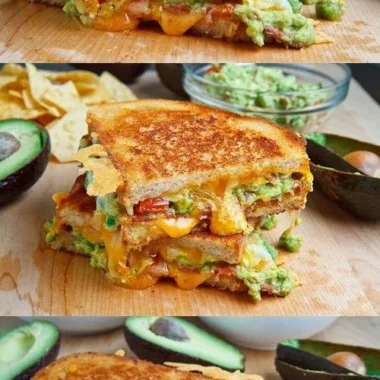 Bacon guacamole grilled cheese sandwich with melted cheese and fresh ingredients