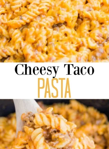 Dish of cheesy taco pasta topped with cheese and fresh herbs