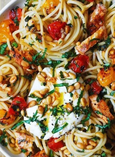 Lemon Butter Garlic Chicken Pasta topped with Roasted Cherry Tomatoes and Burrata Cheese