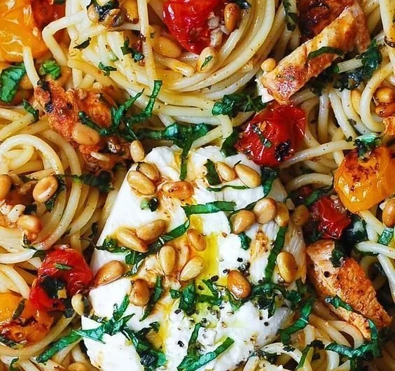 Lemon Butter Garlic Chicken Pasta topped with Roasted Cherry Tomatoes and Burrata Cheese