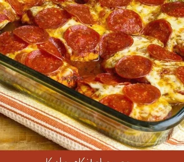 Low-Carb Pepperoni Pizza Chicken Bake topped with cheese and pepperoni slices.
