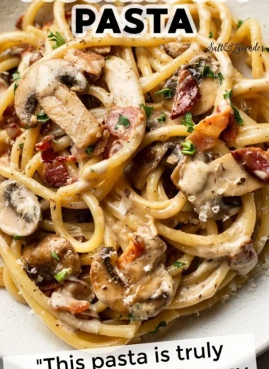 Delicious plate of Bacon and Mushroom Pasta with creamy sauce and fresh herbs