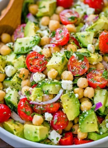 Healthy chickpea salad with vegetables and dressing