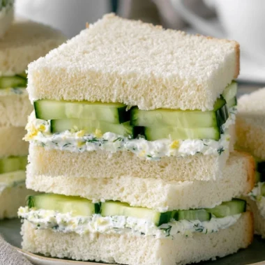 Delicious cucumber sandwiches served on a picnic table