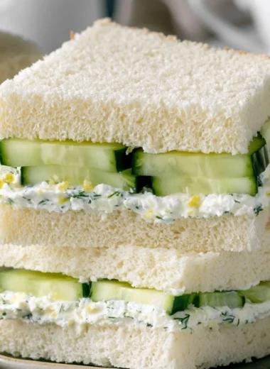 Delicious cucumber sandwiches served on a picnic table