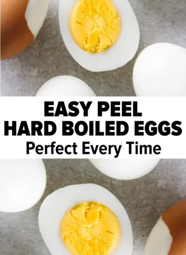 Perfectly cooked hard boiled eggs on a plate garnished with herbs