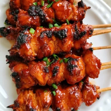 Delicious Korean chicken skewers marinated and grilled for a tasty dish.