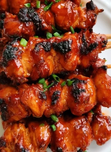 Delicious Korean chicken skewers marinated and grilled for a tasty dish.
