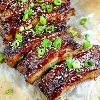 Delicious Sticky Asian Ribs glistening with a flavorful glaze