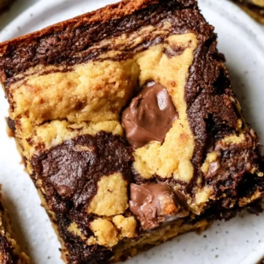 Freshly baked brookies combining chewy brownies and soft cookies.