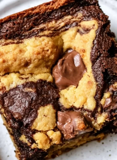 Freshly baked brookies combining chewy brownies and soft cookies.