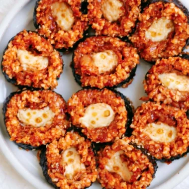 Delicious Cheese Kimchi Kimbap rolled with rice, cheese, and spicy kimchi