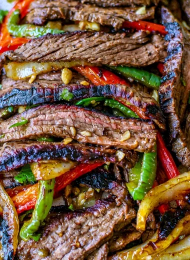 Delicious cozy steak fajitas served with peppers and onions