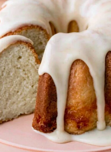 Moist and easy vanilla bundt cake on a decorative cake stand