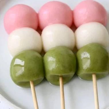 Picture of colorful easy Hanami Dango served on a traditional Japanese plate.
