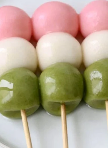 Picture of colorful easy Hanami Dango served on a traditional Japanese plate.