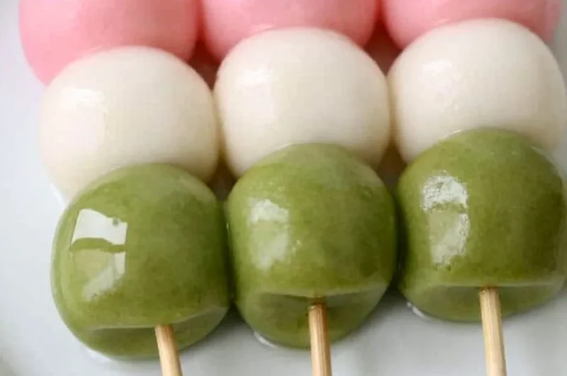 Picture of colorful easy Hanami Dango served on a traditional Japanese plate.