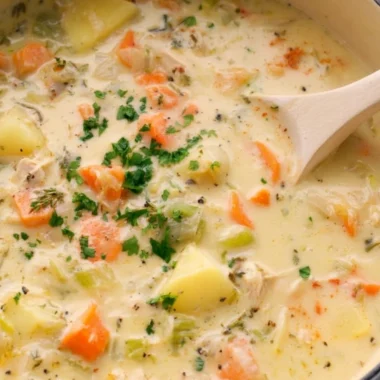 Bowl of easy leftover turkey soup with vegetables and herbs
