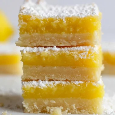 Delicious homemade easy lemon bars with a golden crust and vibrant lemon filling
