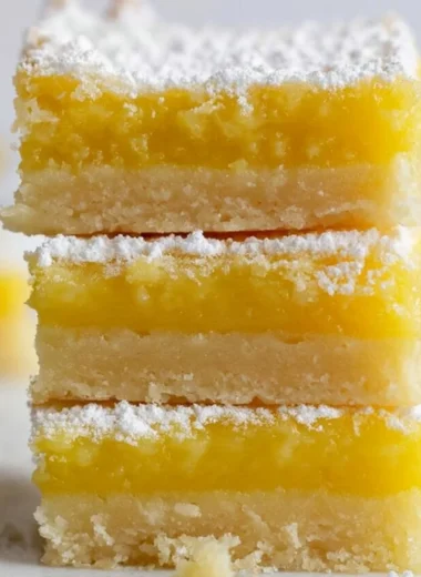 Delicious homemade easy lemon bars with a golden crust and vibrant lemon filling