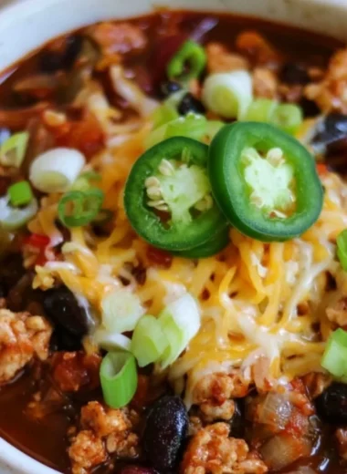 Bowl of high protein chili with beans and vegetables