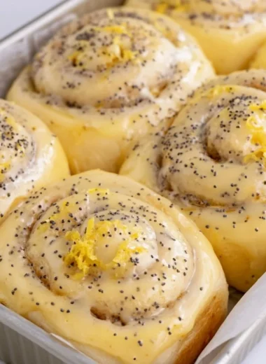 Freshly baked lemon rolls with a citrus glaze