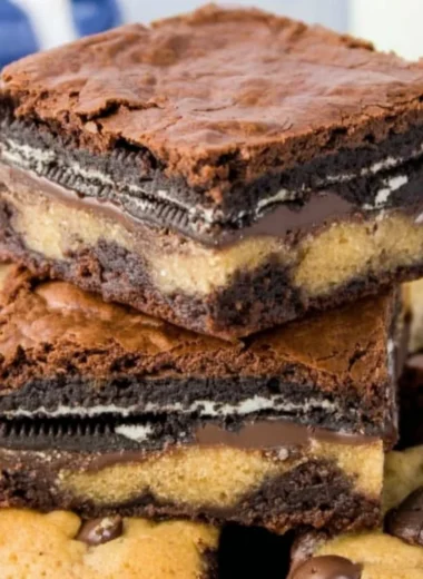 Decadent Oreo cookie dough brownies with chocolate and cream filling