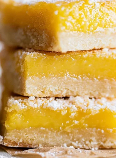 Delicious super easy lemon bars with creamy lemon filling and golden crust