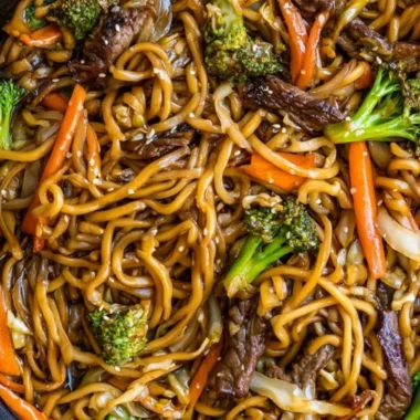 A hearty bowl of Cozy Beef Lo Mein with fresh vegetables and tender beef.
