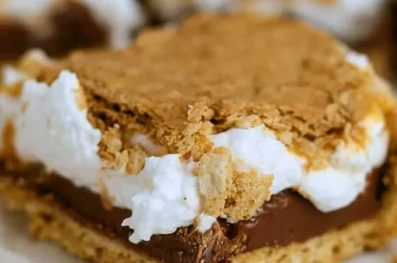 Cozy S'mores Bars with graham crackers, chocolate, and marshmallows