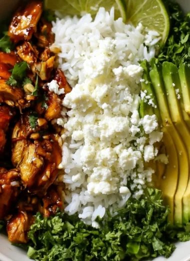 Honey Lime Chicken and Avocado Rice Bowl with fresh ingredients